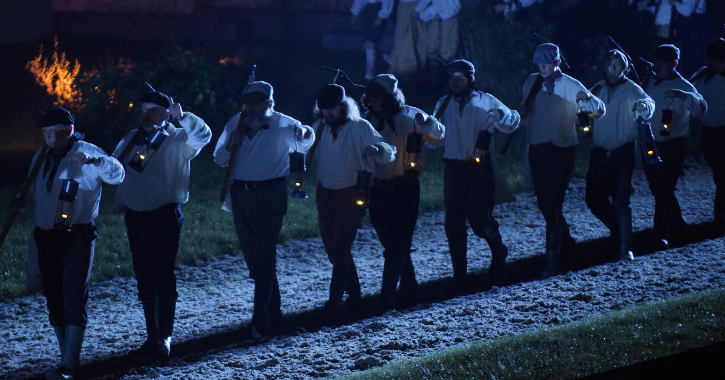 men dressed as miners performing as part of Kynren An Epic Tale of England.